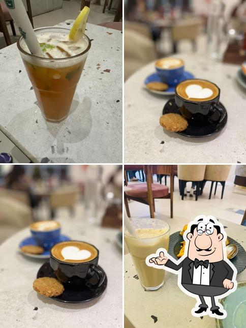 Take a seat at one of the tables at Love over coffee vidhyadhar nagar