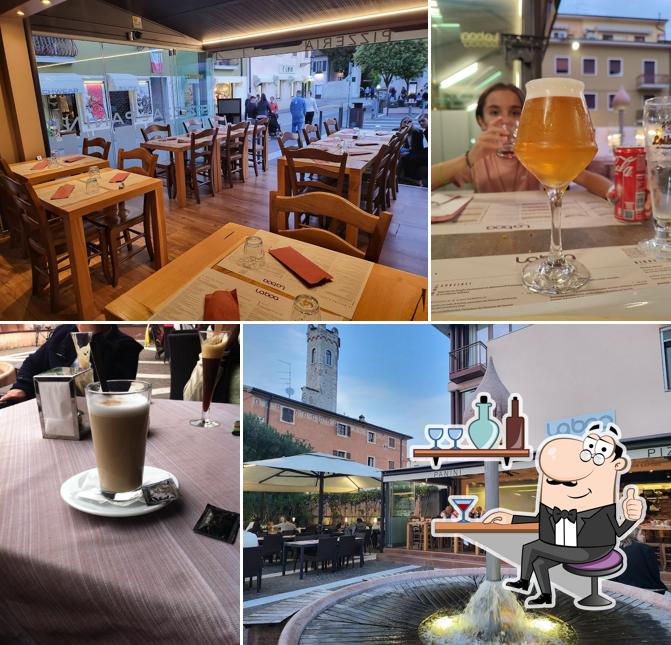 Dai un'occhiata agli interni di Pizzeria La Boa