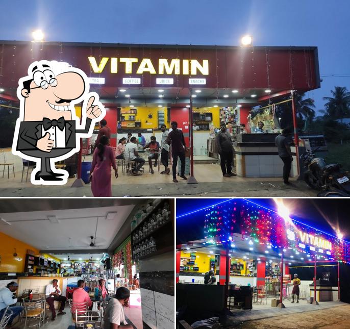 Look at the photo of VITAMIN JUICE AND SNACKS