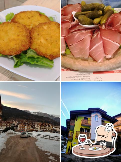 Tra le diverse cose da RISTORANTE PIZZERIA CAMPO BASE si possono trovare la cibo e esterno