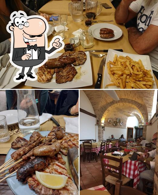 Guarda la foto che presenta la interni e bevanda di Trattoria La Tavernetta Da Ianni