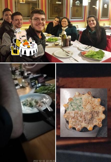 Esta é a imagem mostrando comida e interior a Pizzaria Casa Nossa