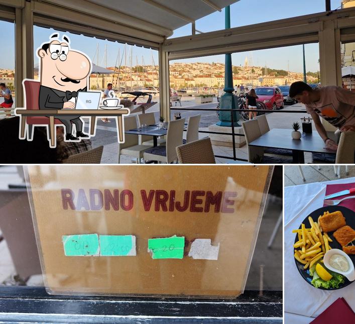 La immagine della interni e cibo di Pizzerija Koralj