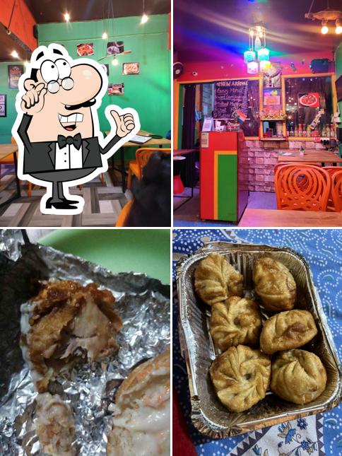 Take a seat at one of the tables at Popular Fresh Momos 'n' More