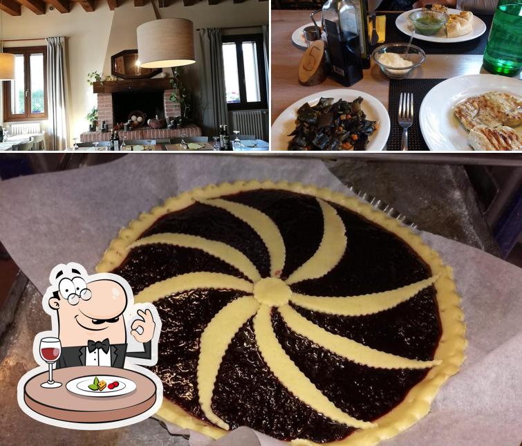 Guarda la immagine che raffigura la cibo e interni di Osteria Dai Salvarza