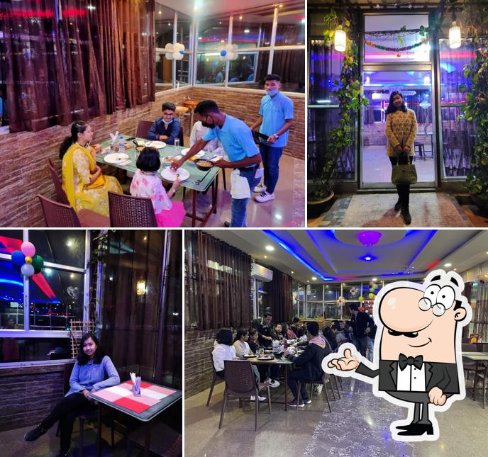 Take a seat at one of the tables at D' PRIMLAND RESTAURANT