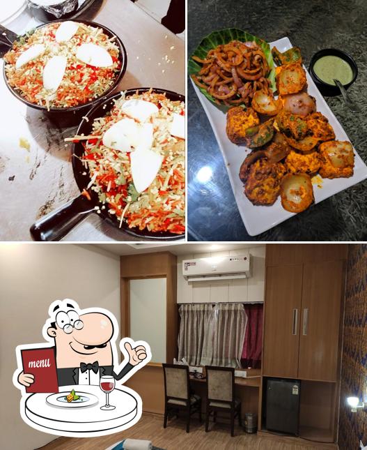 Check out the photo depicting food and interior at Chanson Hotels - New Delhi