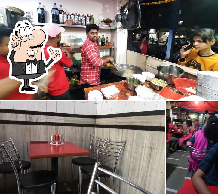 The interior of Radhe Radhe Chinese Restaurant Pure Veg