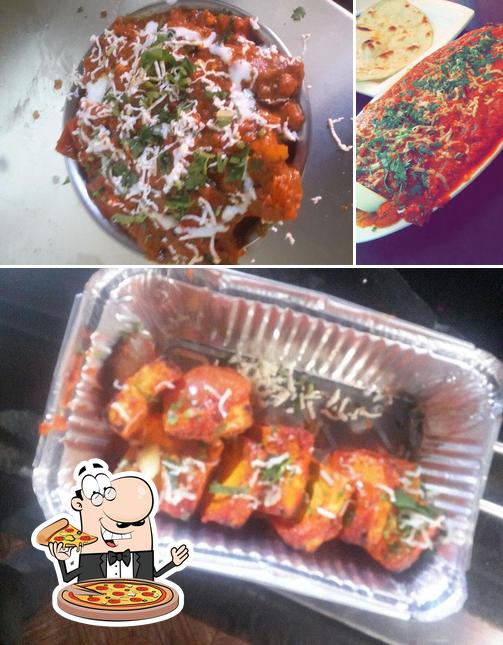 Get pizza at Malashree Pure Veg