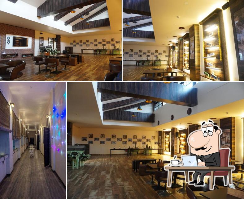 Take a seat at one of the tables at NTC CAFE BY DUNKEL BRAUN