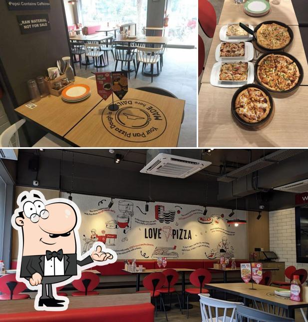 The interior of Pizza Hut Atlanta Mall, Surat