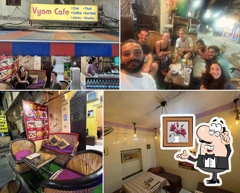 Take a seat at one of the tables at Vyom cafe