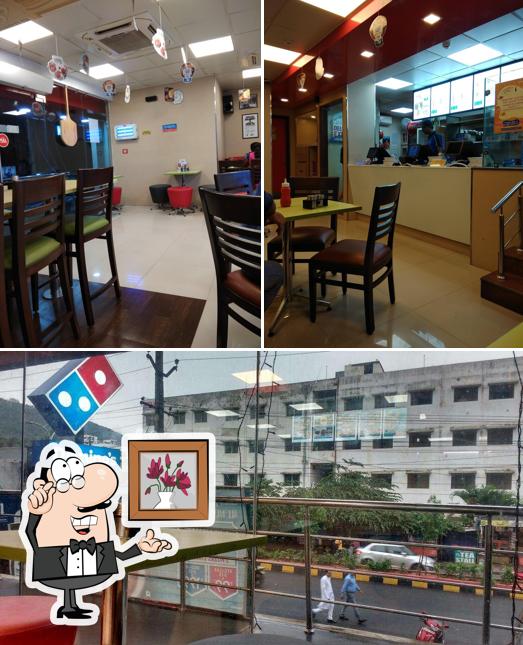 Take a seat at one of the tables at Domino's Pizza MVP Colony, Visakhapatnam