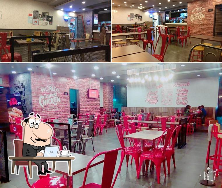 Take a seat at one of the tables at KFC