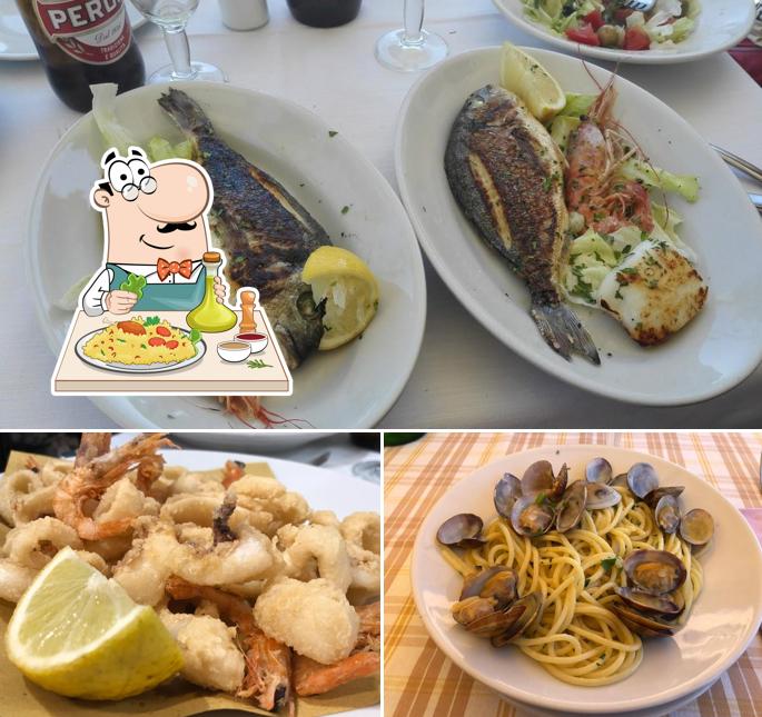 Platti al Ristorante Pizzeria Adriano a Mare