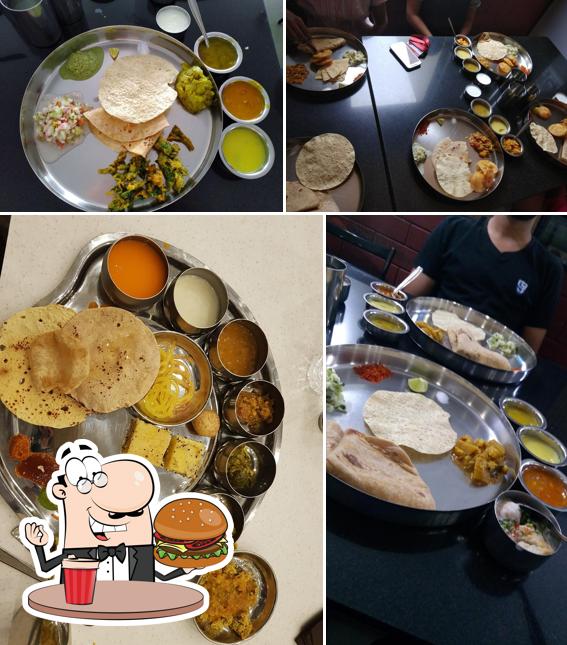 Order a burger at Naivedyam Dining Hall