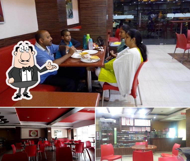 Take a seat at one of the tables at Bakers Inn