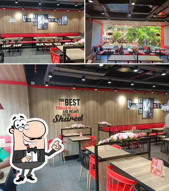 Take a seat at one of the tables at KFC