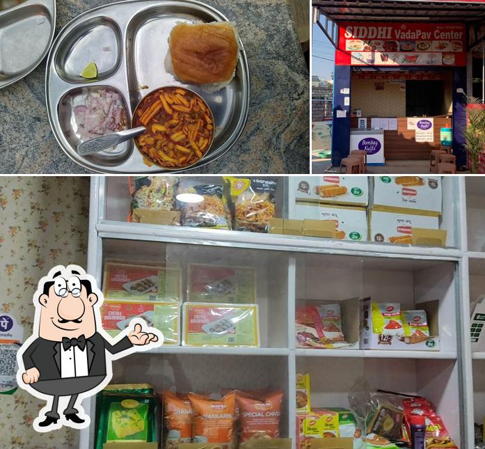 Among various things one can find interior and food at SIDDHI VADAPAV CENTER