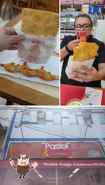 Esta é a imagem ilustrando comida e exterior a Pastel e Garapa