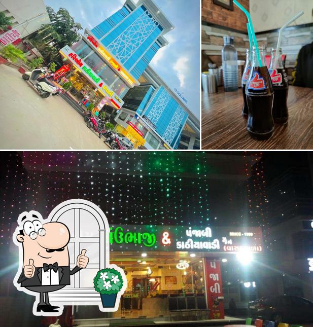 This is the image displaying exterior and beer at Hari Om Kathiyawadi & Punjabi Restaurant