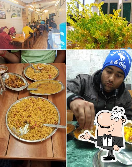 Take a seat at one of the tables at Rajinder Vaishnav Dhaba