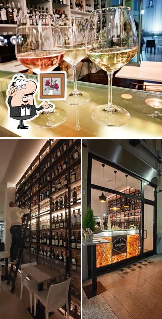 Dai un’occhiata alla immagine che presenta la interni e cibo di Aroma Winebar & Enoteca