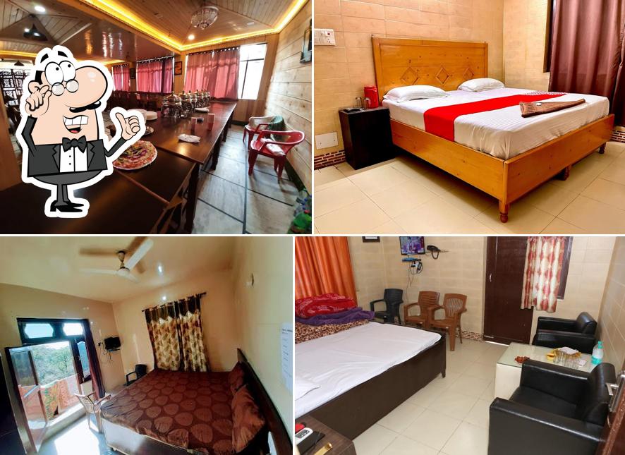 Take a seat at one of the tables at Hotel Raj Golden & Restaurant Palampur