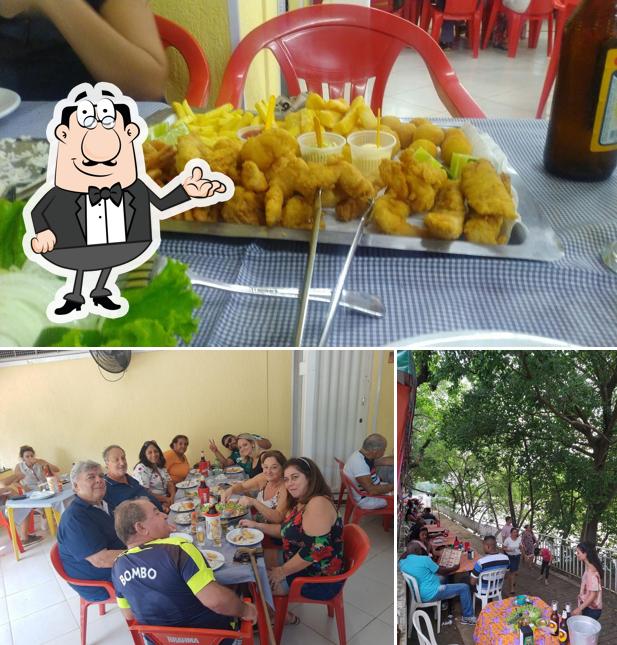 Sente em uma das mesas no Restaurante Petisco & Cia