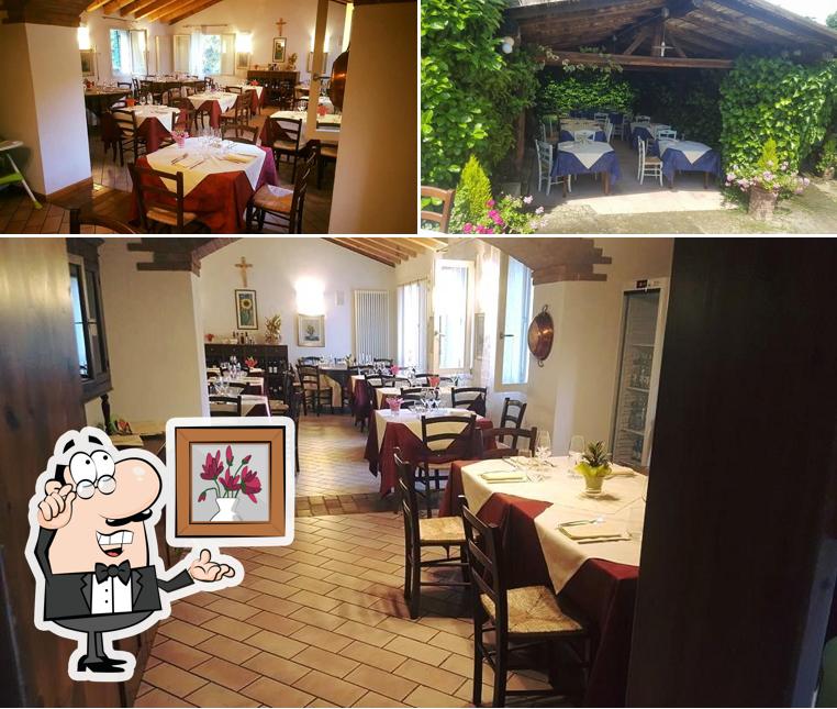 Dai un'occhiata agli interni di Trattoria alla Roa