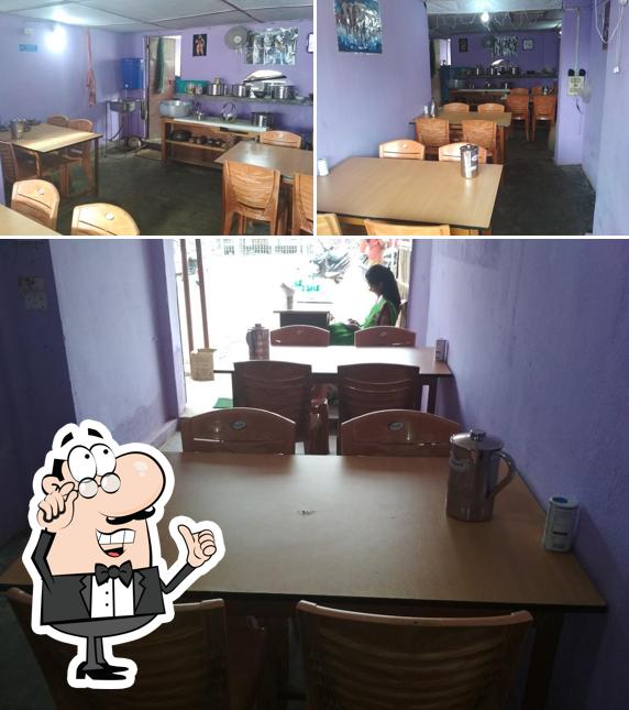 Take a seat at one of the tables at Hotel Runjun