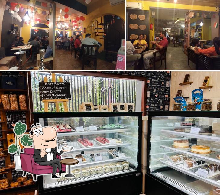 Take a seat at one of the tables at Planter's Tea Bar & Book Cafe