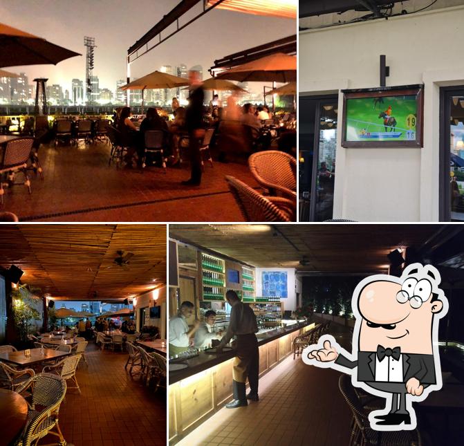 Sente em uma das mesas no Iulia Jockey Club