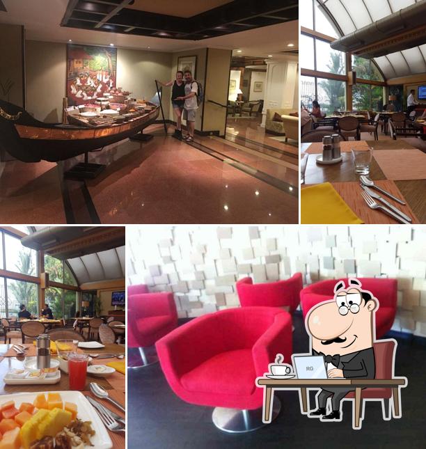 Take a seat at one of the tables at Bubble Cafe - Vivanta Ernakulam