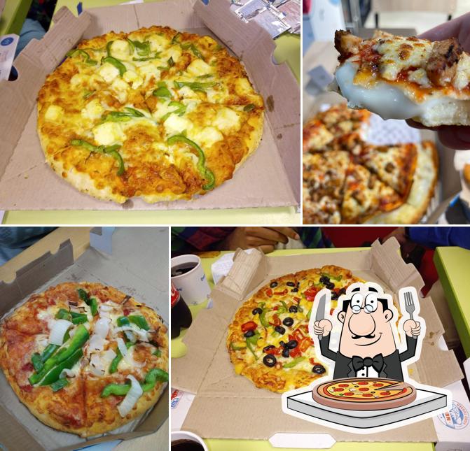 At Domino's Pizza Vasundhara Enclave, New Delhi, you can try pizza