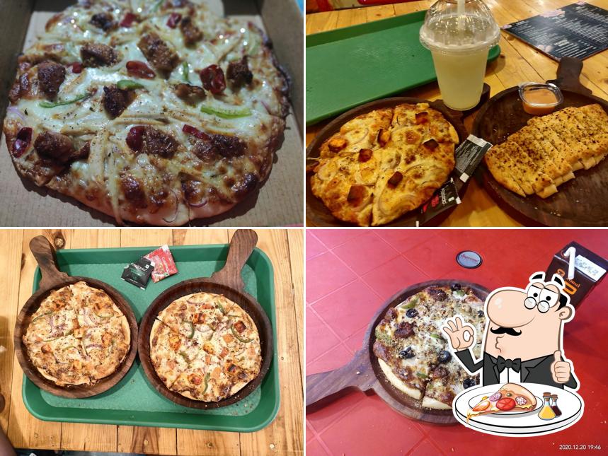 Order pizza at Laziz Pizza Canacona