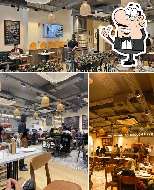 Check out how Si Nonna's - The Original Sourdough Pizza Koramangala Bengaluru looks inside