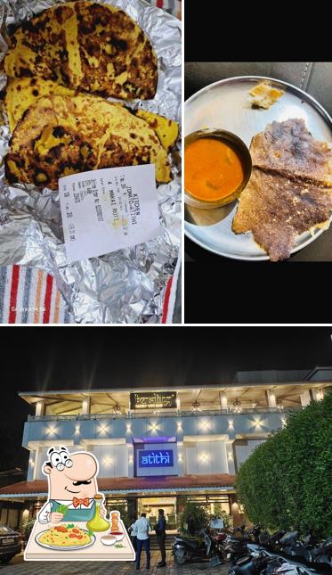 Take a look at the photo showing food and exterior at ATITHI VEG
