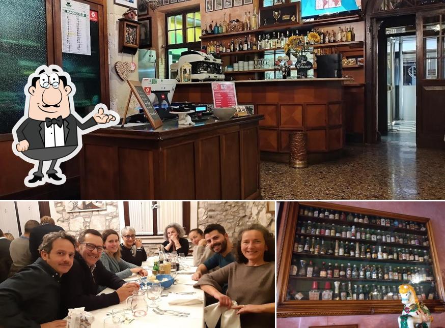 Siediti a un tavolo di Ristorante Trattoria al Cacciatore