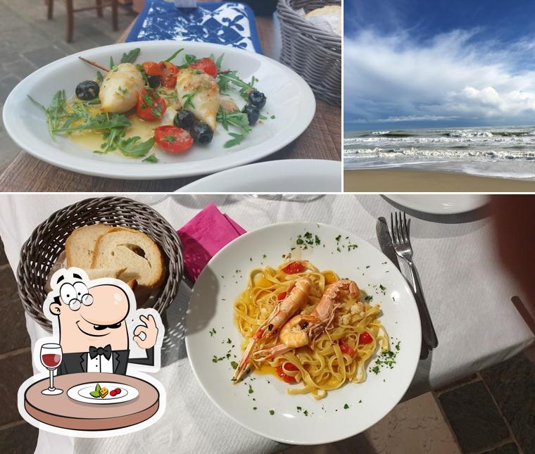 Guarda la foto che presenta la cibo e esterno di Angolo 74