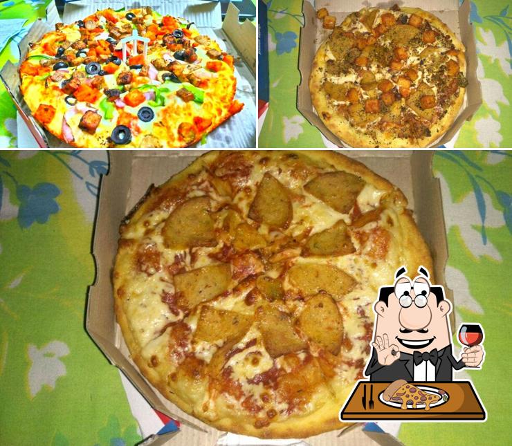 Get pizza at Domino's Pizza Phoenix United Mall, Lucknow