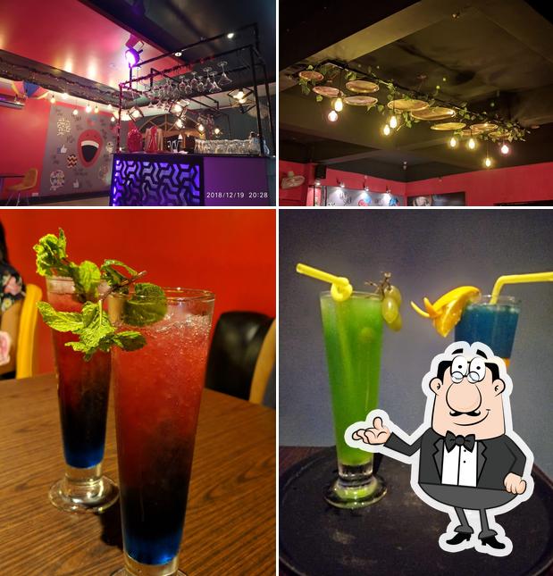 Check out the image showing interior and drink at Hunger Vunger Restaurant