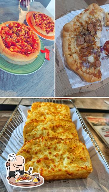 Pick pizza at Pizza Hut Saharanpur road, Dehradun