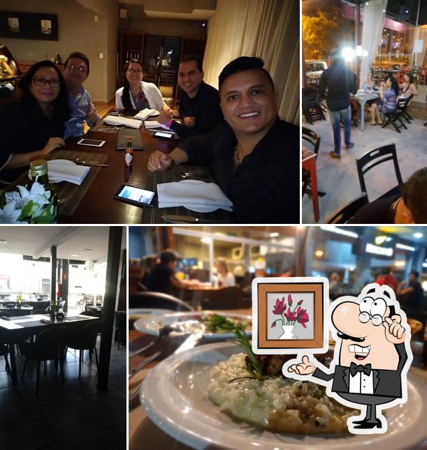 Sente em uma das mesas no Mercatto Empório Gourmet