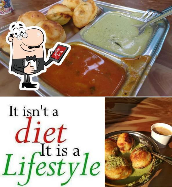 Look at the photo of Omkar Snacks