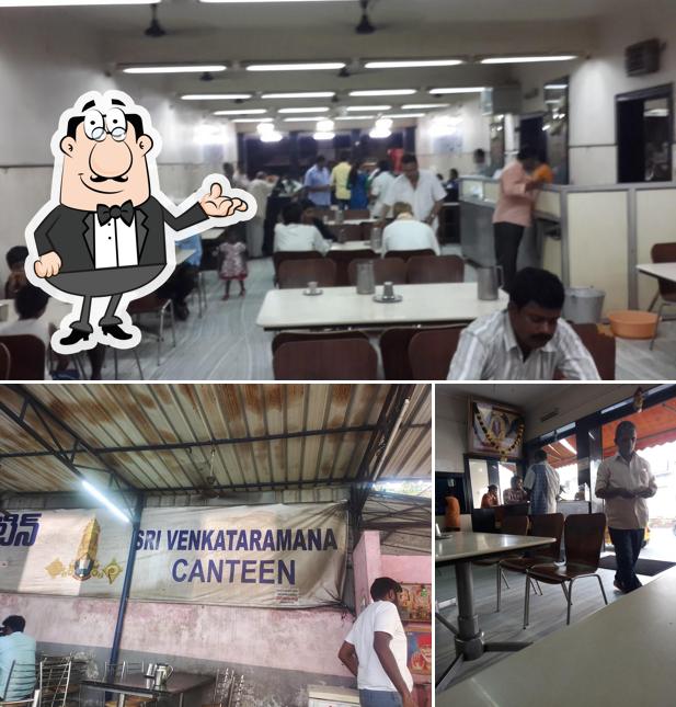 Take a seat at one of the tables at Sri Venkata Ramana Hotel