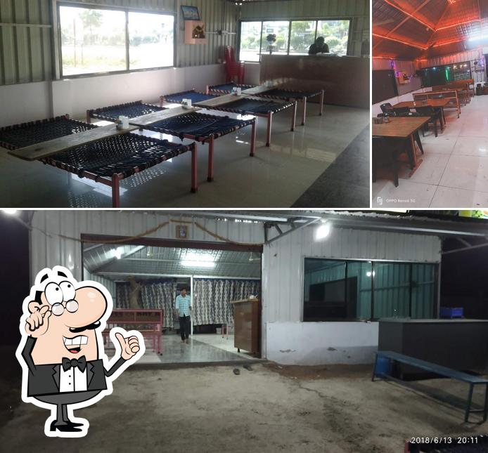 Take a seat at one of the tables at Jay Baba Ramdev Dhaba