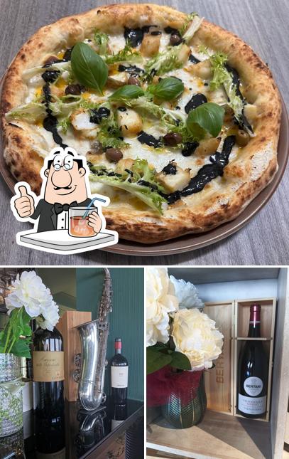 Tra le varie cose da La Cumbia Pizzeria moderna si possono trovare la bevanda e pizza