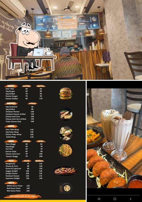 Take a seat at one of the tables at CAFEDINE Cafe & Resto