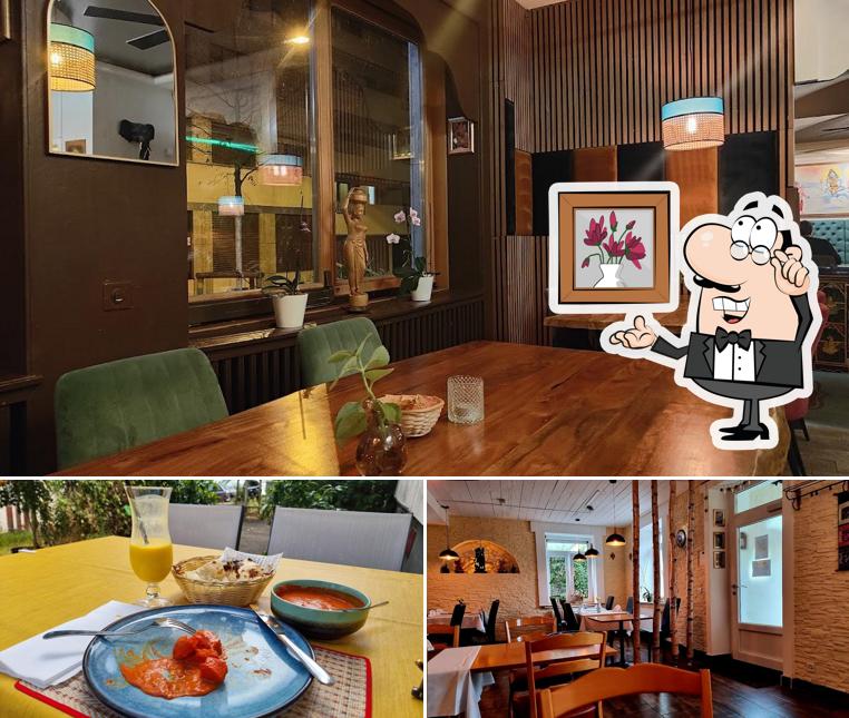 Gli interni di Restaurant Indian Summer Nord Kitchen